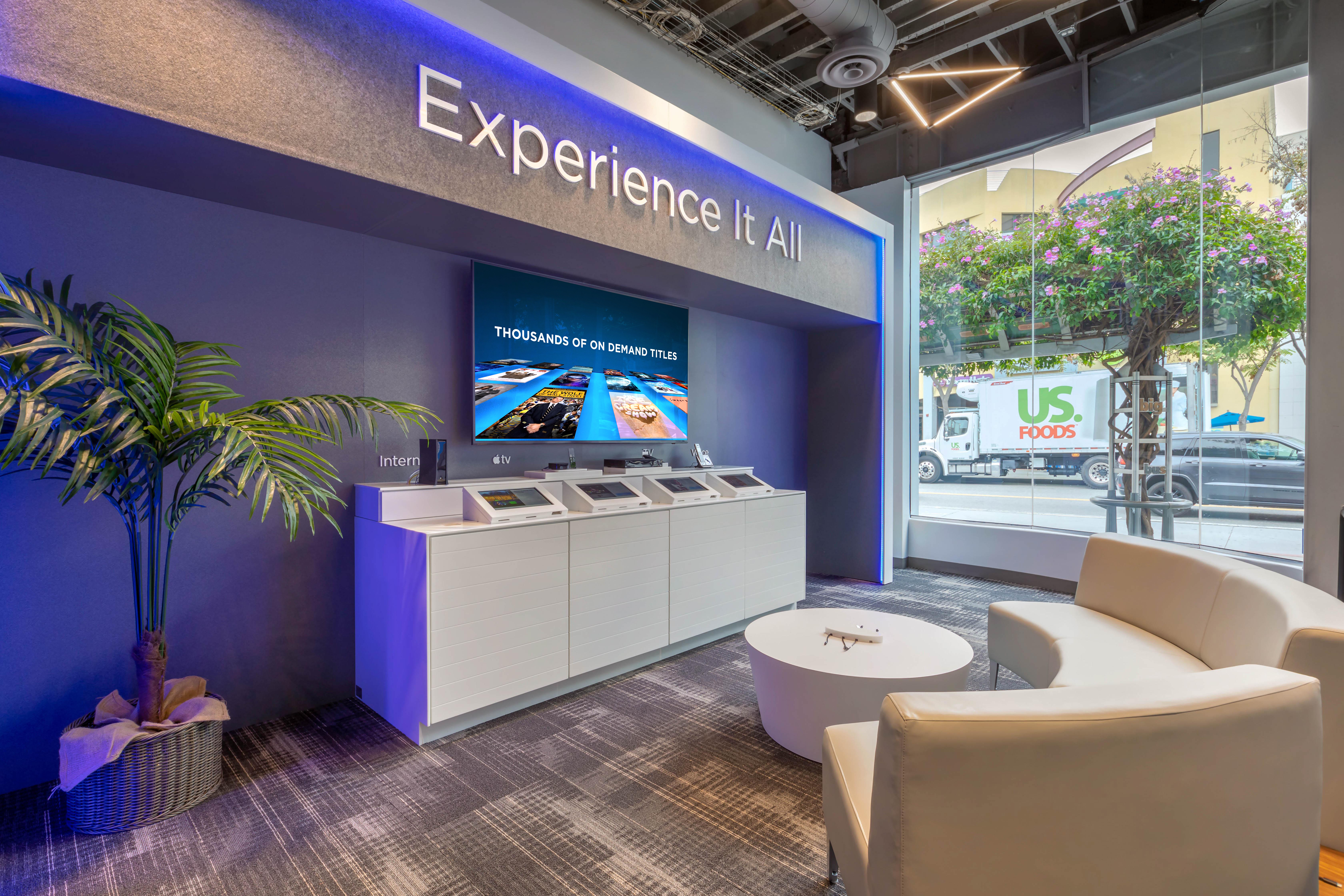 Spectrum Experience Zone with streaming demo displays and interactive kiosks